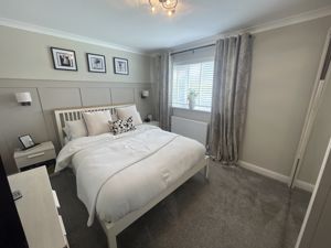 Bedroom One- click for photo gallery